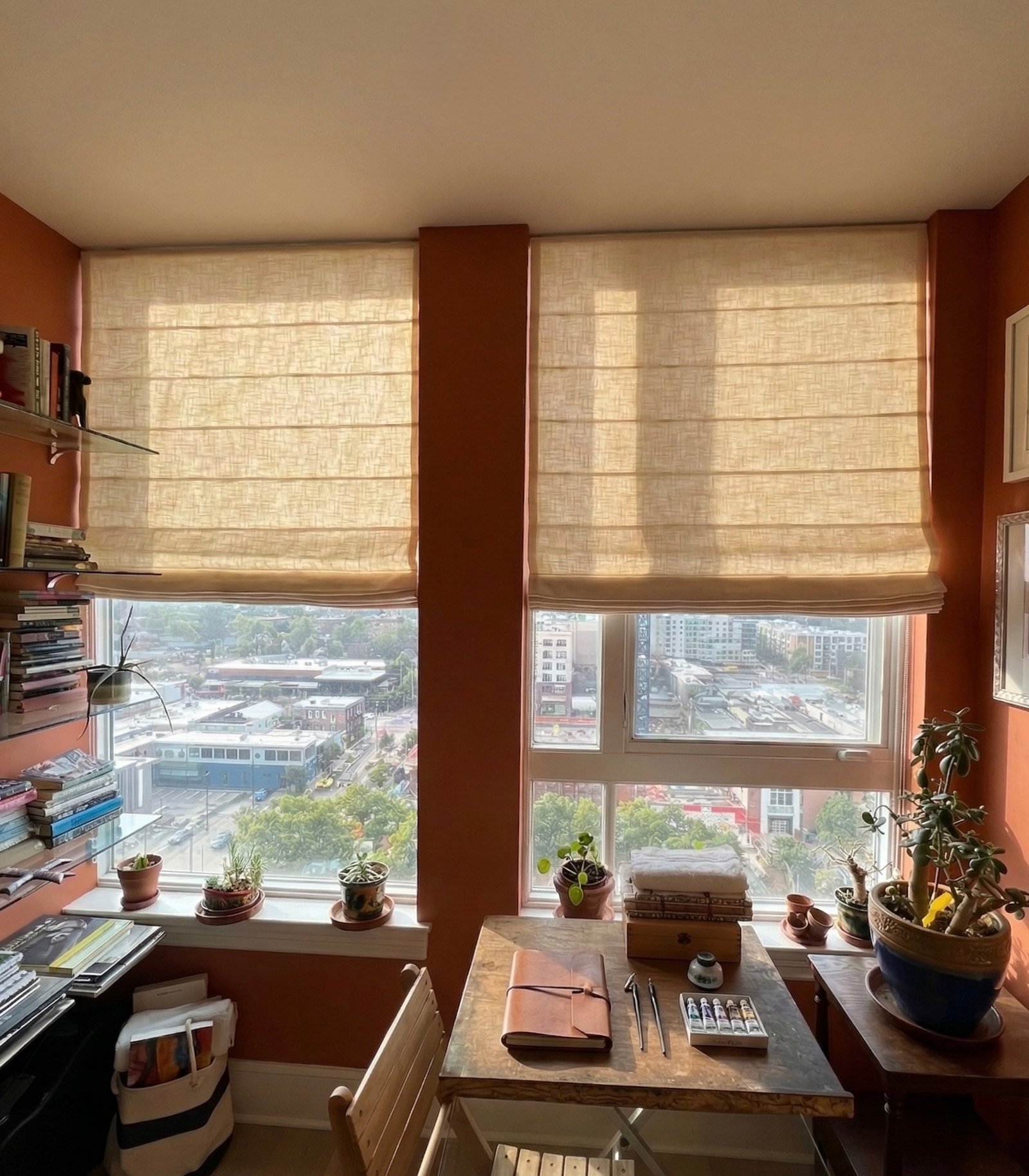 Living room with elegant roman shades